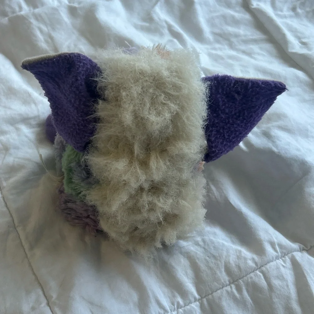 Colorful Plush Bird Toy with Purple Accents